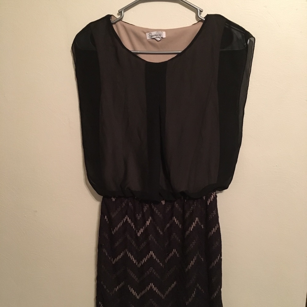 Black and cream loose top body con dress